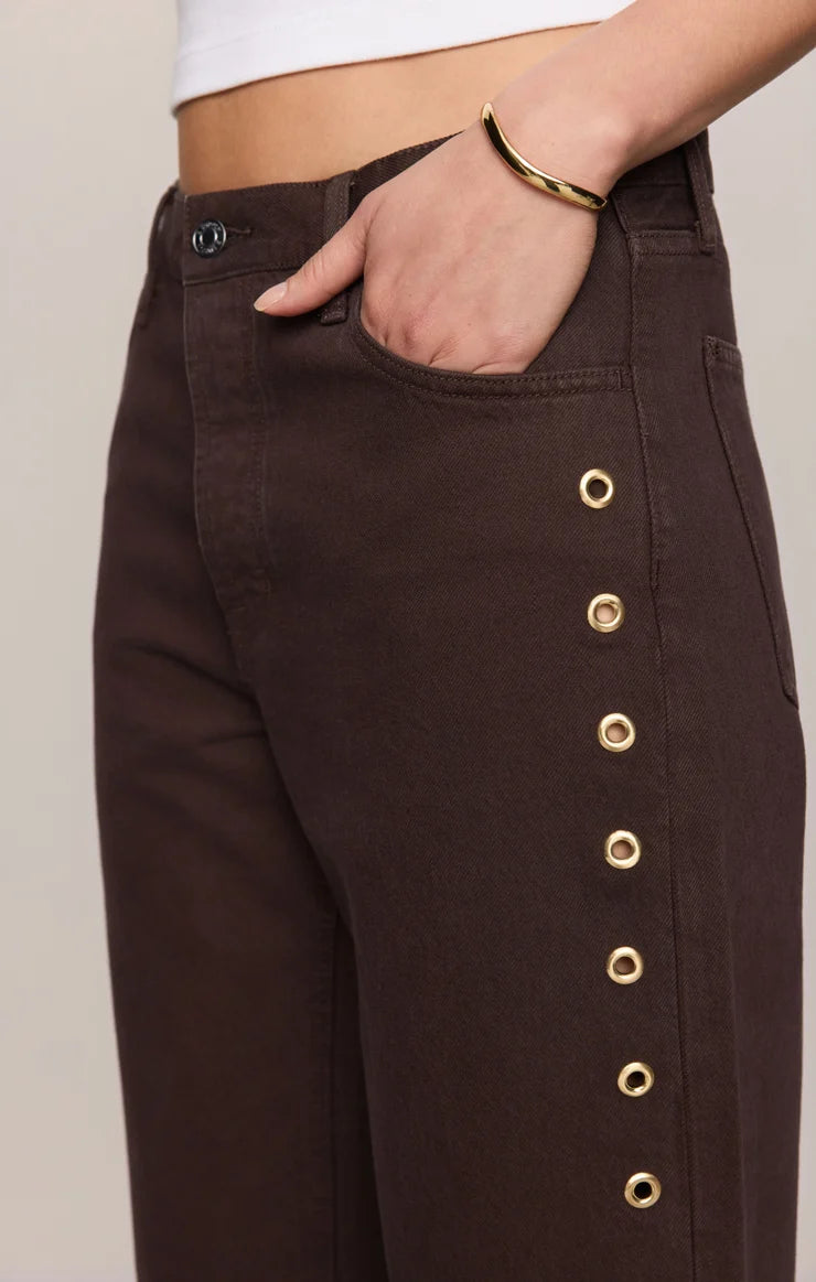 THE OFF DUTY MID-RISE BOWED ANKLE DENIM IN GILDED UMBER