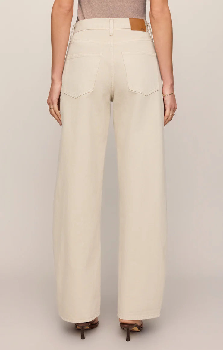 THE SHOW OFF DENIM HIGH-RISE BOWED