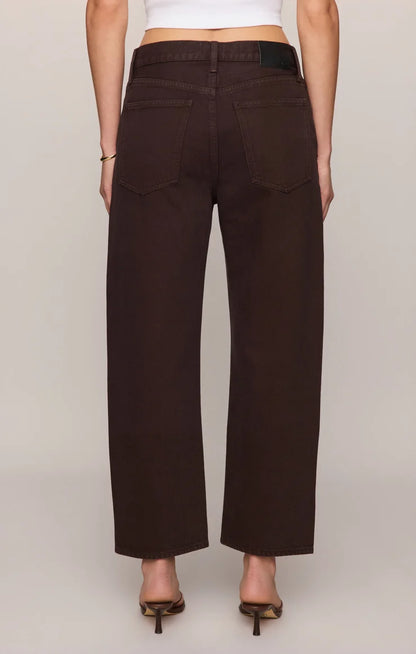 THE OFF DUTY MID-RISE BOWED ANKLE DENIM IN GILDED UMBER