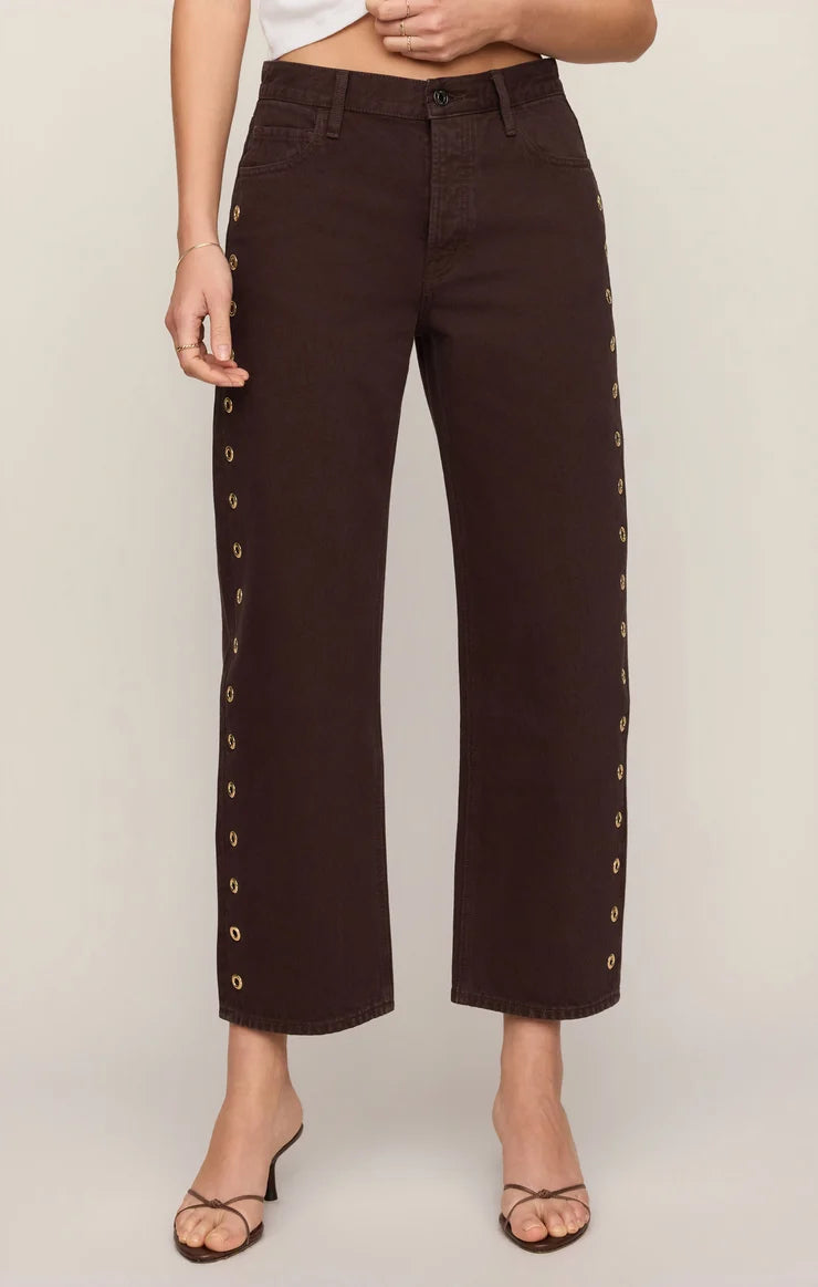 THE OFF DUTY MID-RISE BOWED ANKLE DENIM IN GILDED UMBER