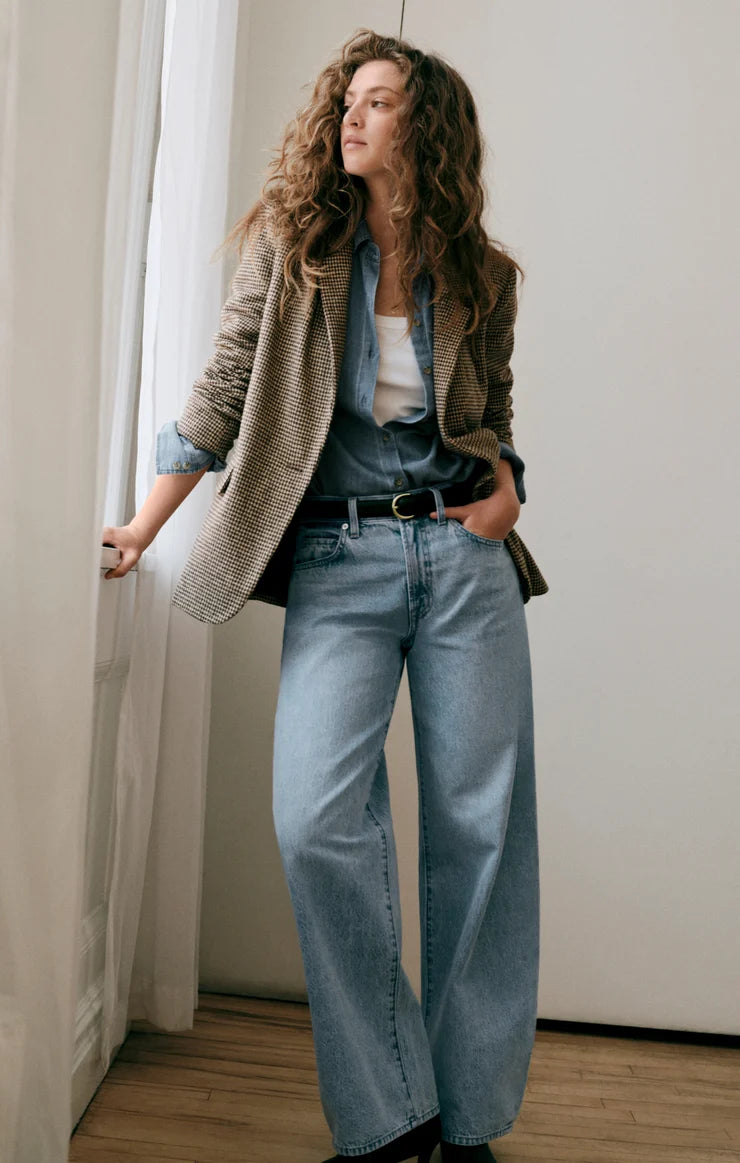 THE SHOW OFF HIGH-RISE BOWED DENIM IN INDIGO BLOOM